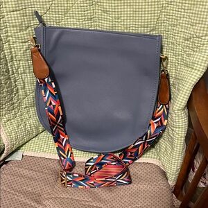 ah dorned Blue Leather Bag with Colorful Strap